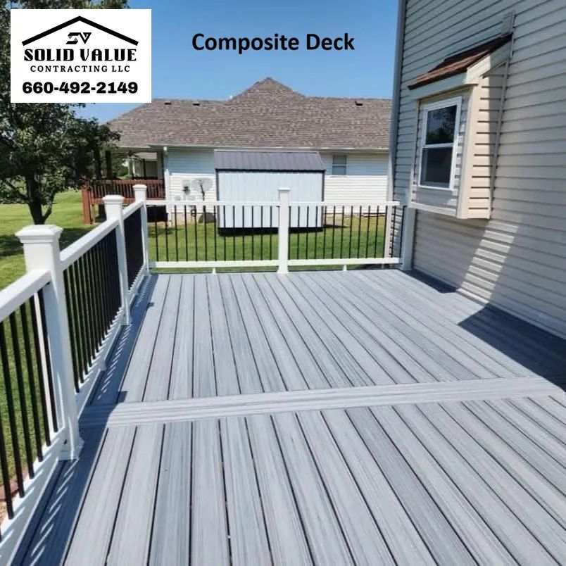 Gray composite deck with railing in Clinton, Missouri