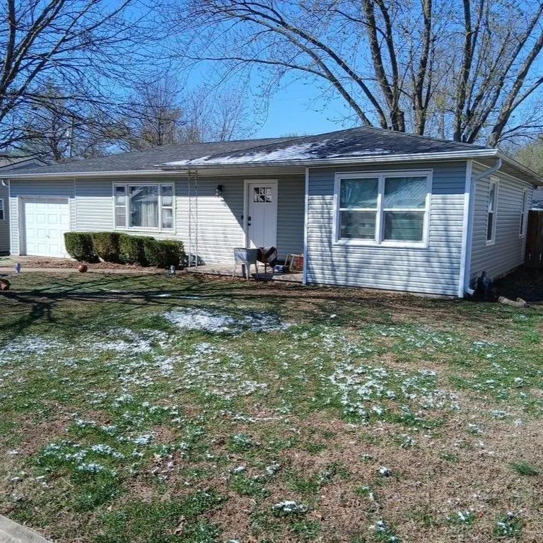 New vinyl siding installed on a house in Clinton, Missouri