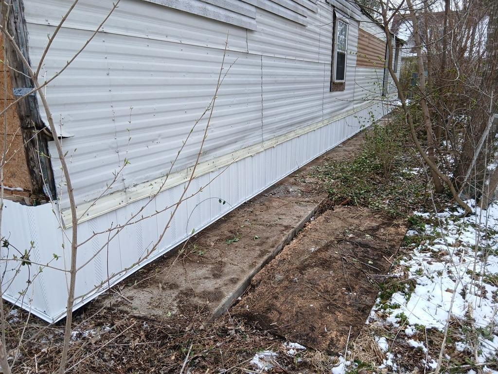 Trailer siding project completed through Solid Value Gives Back