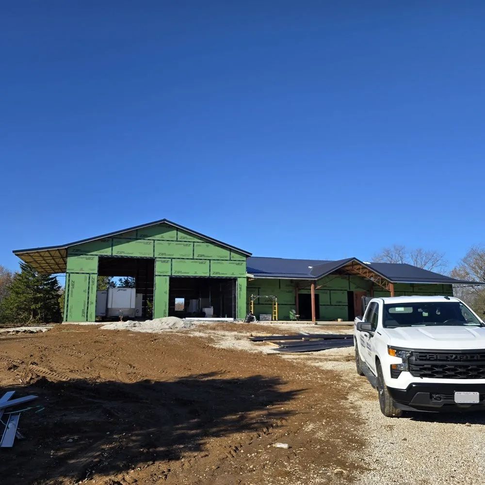 Steel-framed house under construction with framing members exposed