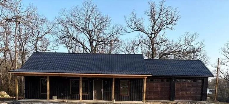 Completed turnkey house build with gabled roofline near Nevada, Missouri